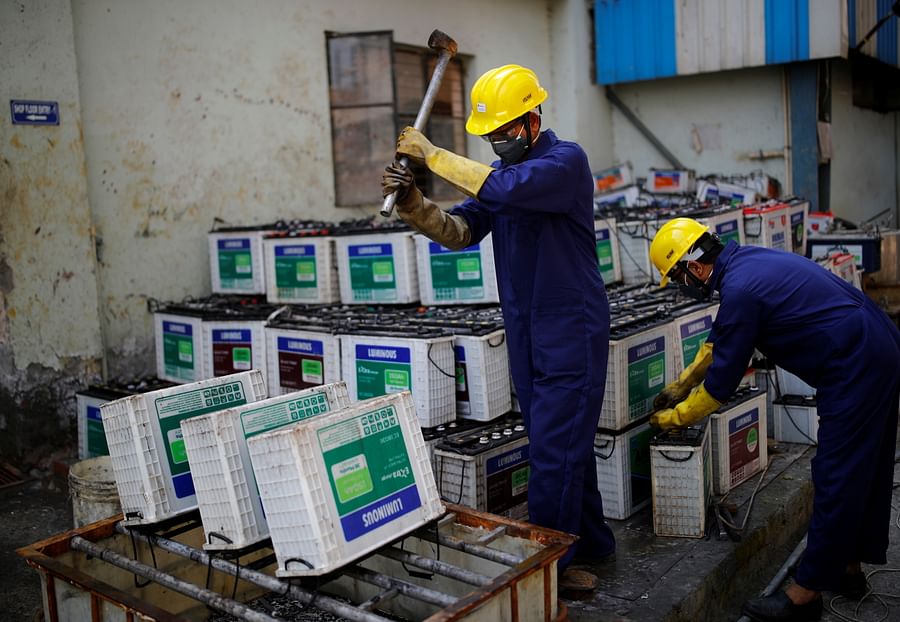 Pile of recycled car batteries ready for eco-friendly disposal